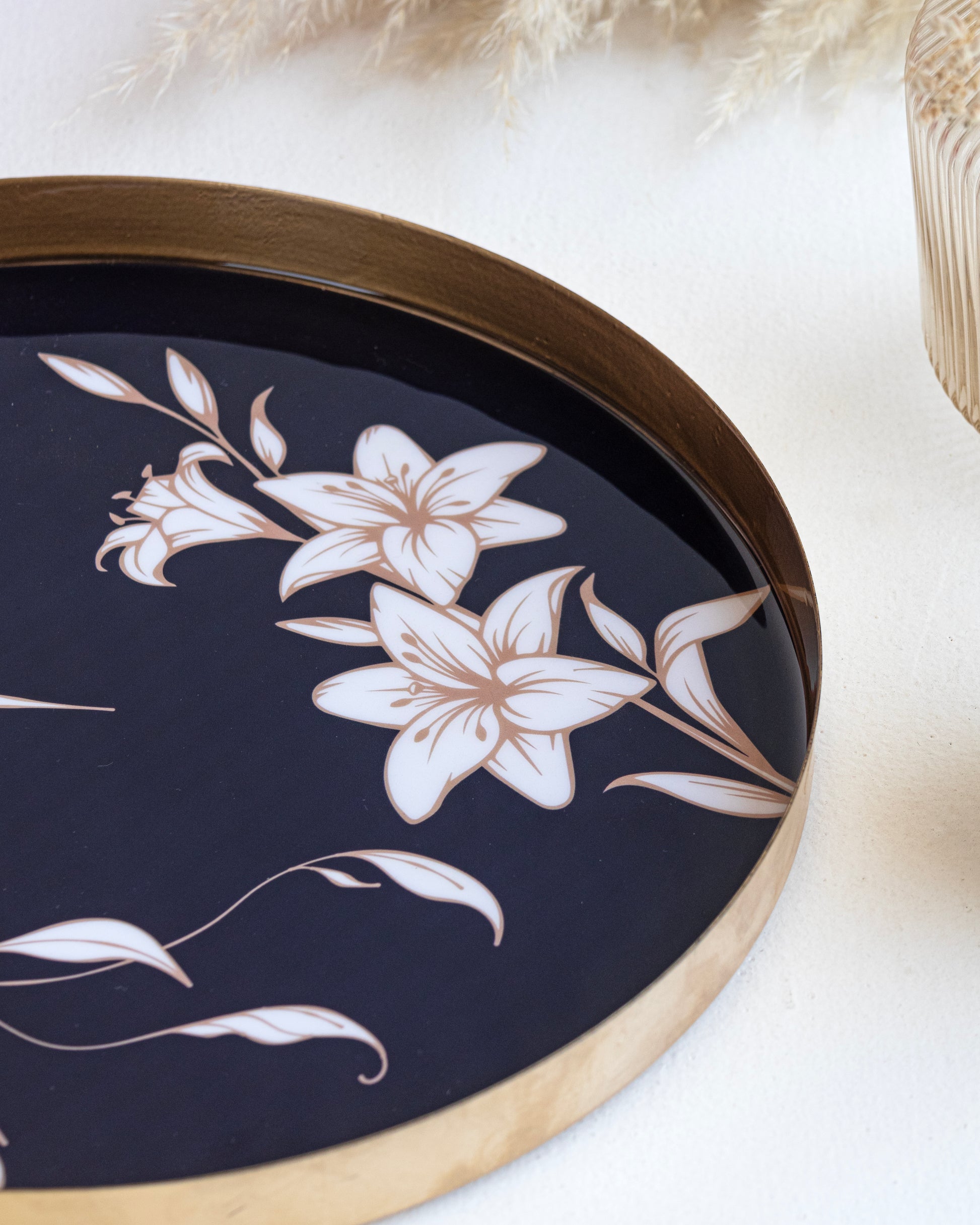 An elegant navy blue tray with floral and hummingbird on an aesthetic table perfect for home and gifts
