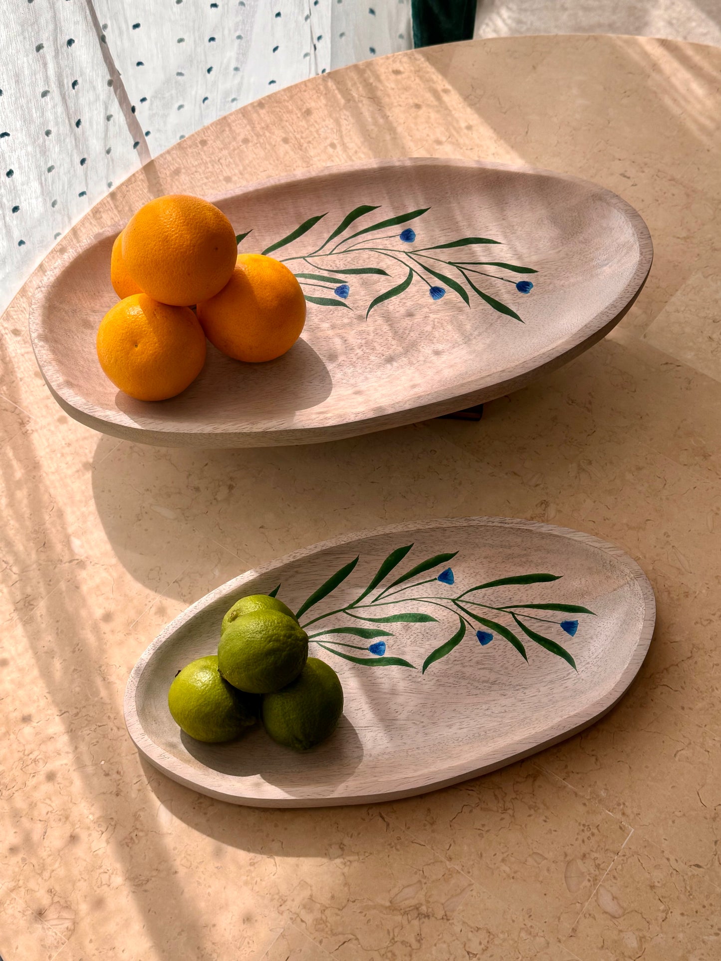 A platter that represents the Japandi Scandinavian style which is ideal as a gift, home decor, serve ware, dinner ware, kitchen and table decor. Made from mango wood which boasts sustainability and eco-friendly option. Durable and easy to clean.